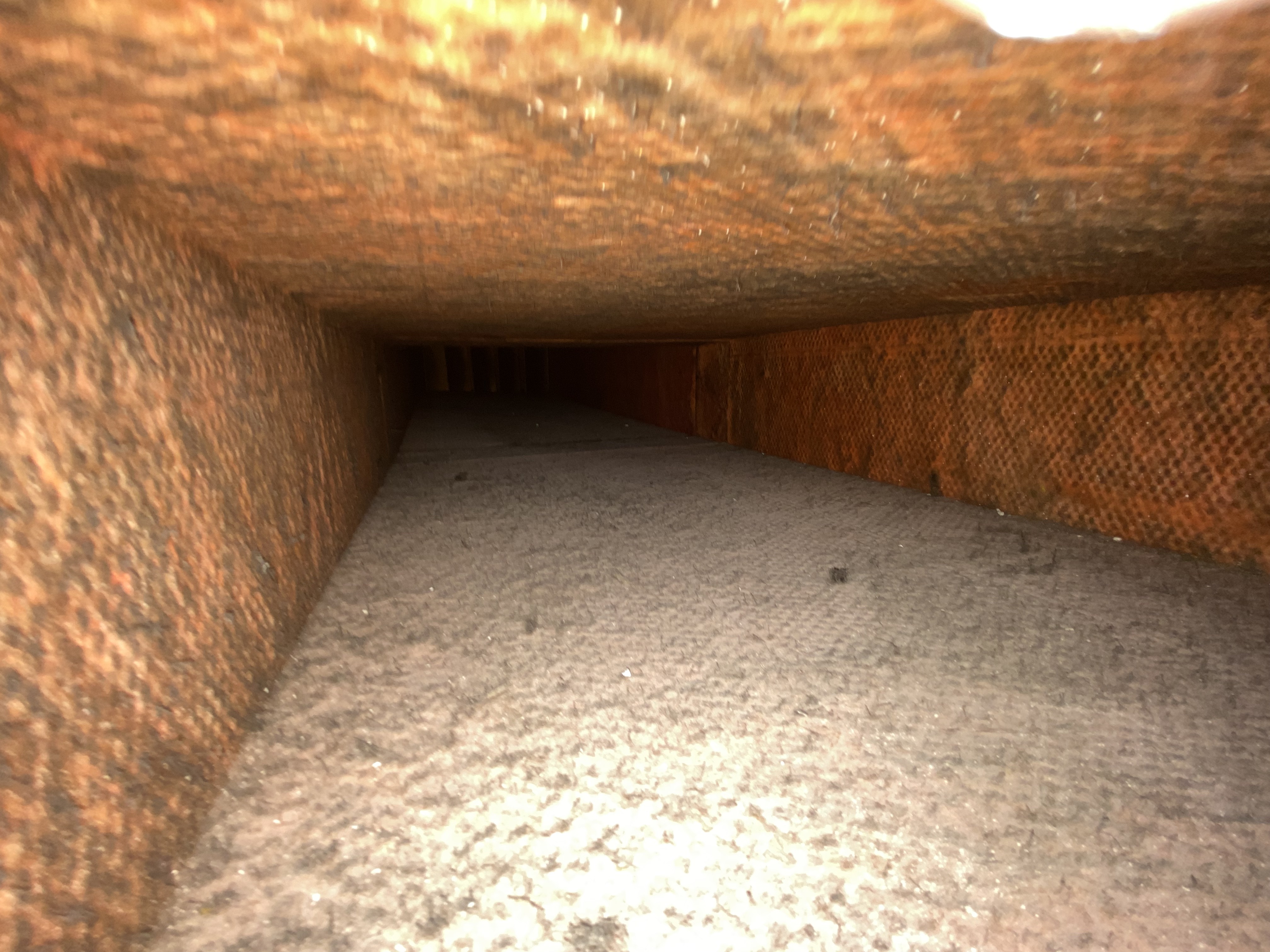 Heavy buildup and dust coating the inside of a supply duct in East Naples, FL